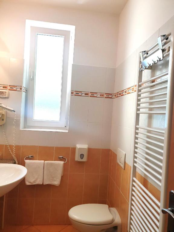 Koupelna v ubytování Garni Hotel Keltika