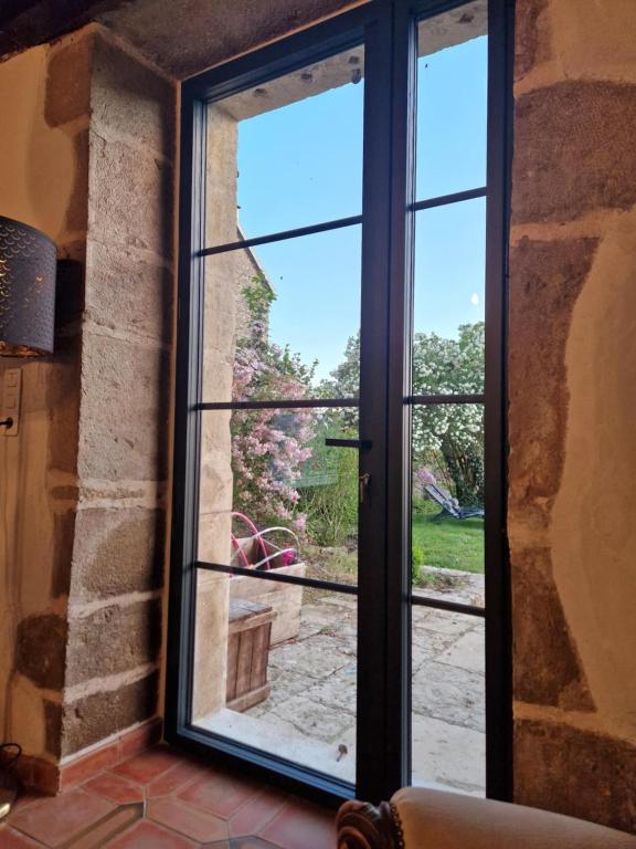 Balkón nebo terasa v ubytování 2 CHAMBRES DANS MAISON EN PIERRE ATYPIQUe