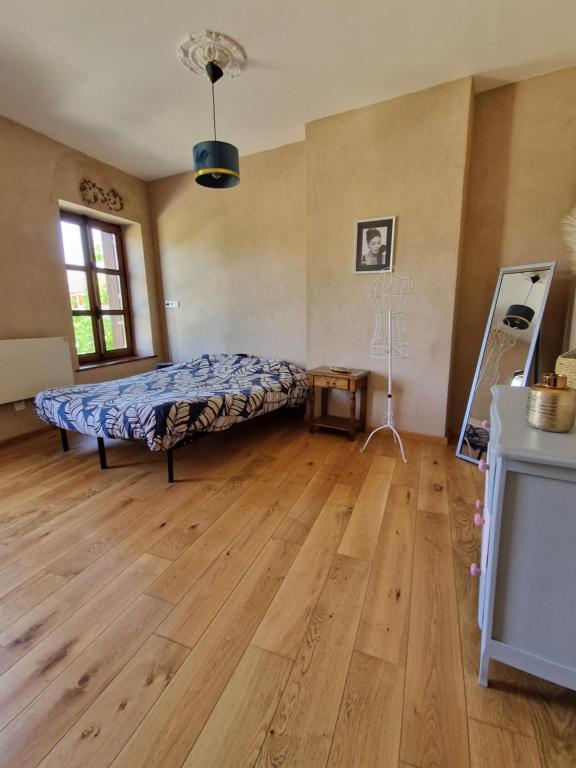 Fotografie z fotogalerie ubytování 2 CHAMBRES DANS MAISON EN PIERRE ATYPIQUe v destinaci Lœuilley