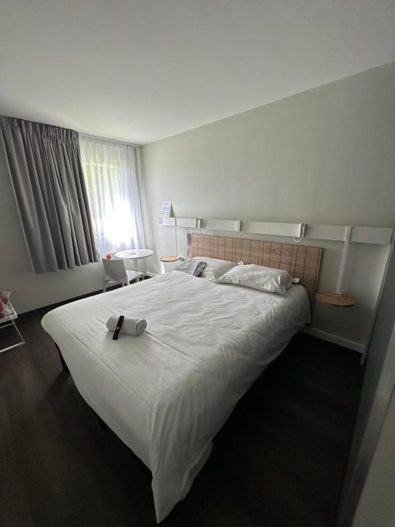Postel nebo postele na pokoji v ubytování ibis Abbeville