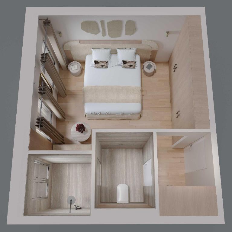 Cette petite chambre comprend un lit et un lavabo. dans l'établissement Charming studio with AC - 2P- Musée du Louvre, à Paris