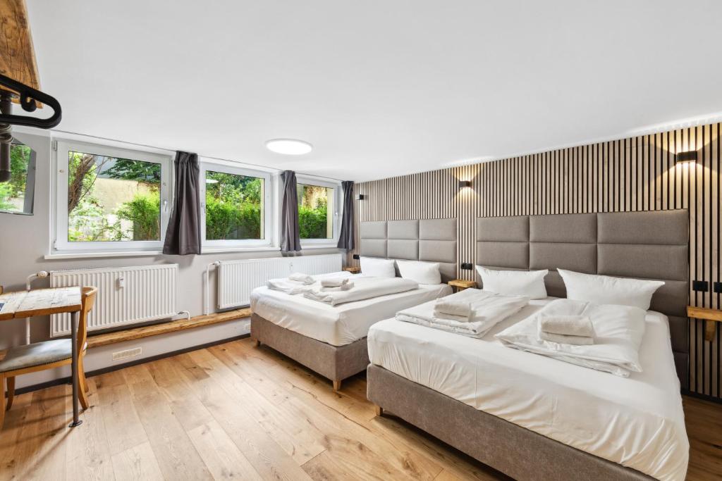 Postel nebo postele na pokoji v ubytování Hotel Comenius