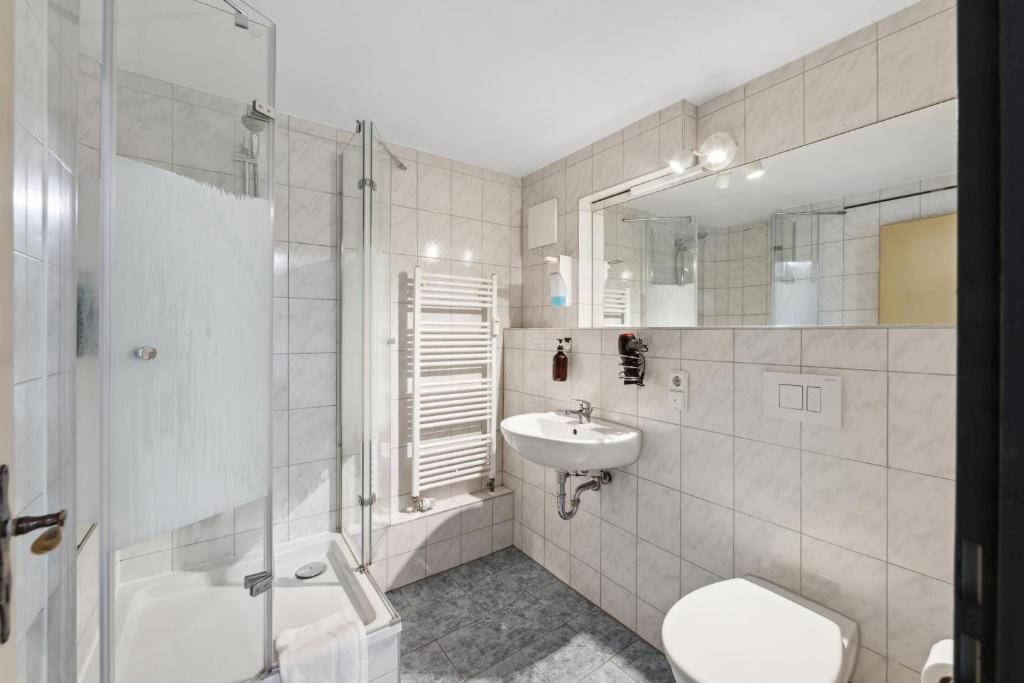 Koupelna v ubytování Hotel Comenius