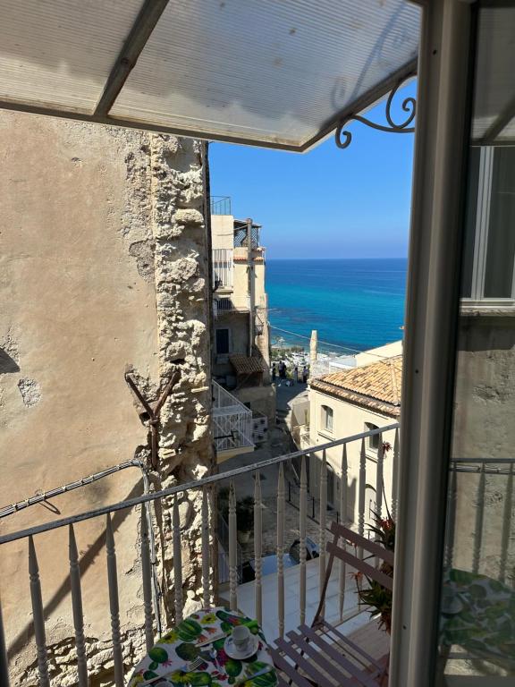 a balcony with a view of the ocean at Affaccio sul Mare in Tropea