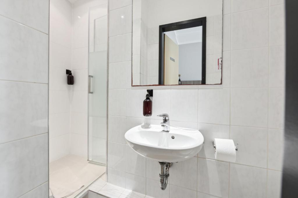 Koupelna v ubytování Hotel Comenius