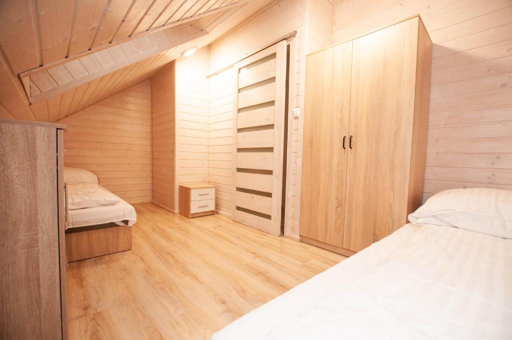 Postel nebo postele na pokoji v ubytování Aparts Care Beztroska