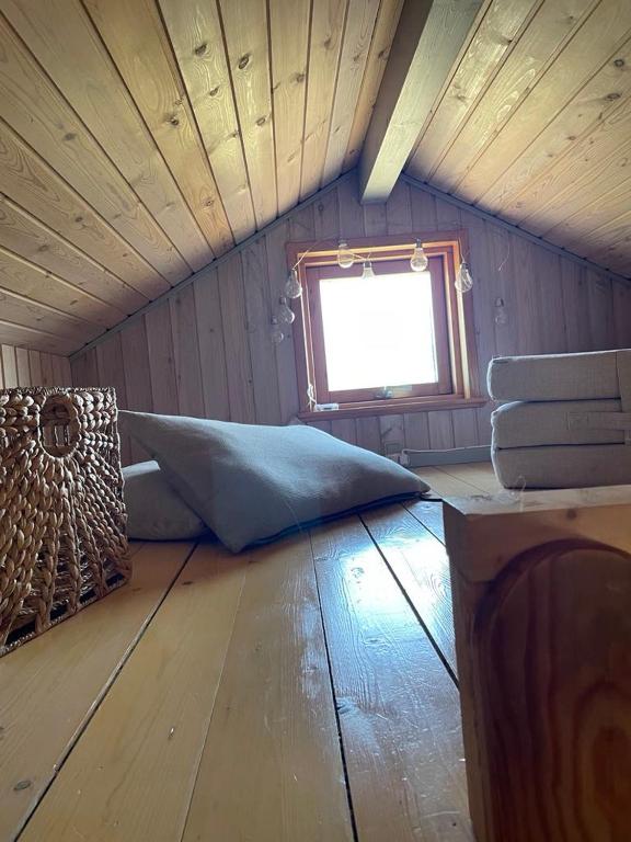 Posezení v ubytování Exclusive Cottage close to Tornby Beach