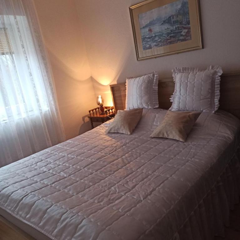 Postel nebo postele na pokoji v ubytování Apartman Adna