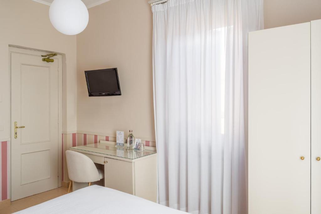 Postel nebo postele na pokoji v ubytování Hotel Parker - Gruppo BLAM HOTELS
