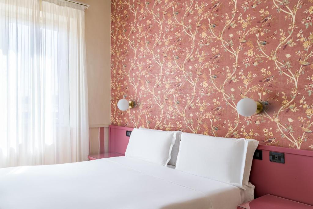 Postel nebo postele na pokoji v ubytování Hotel Parker - Gruppo BLAM HOTELS