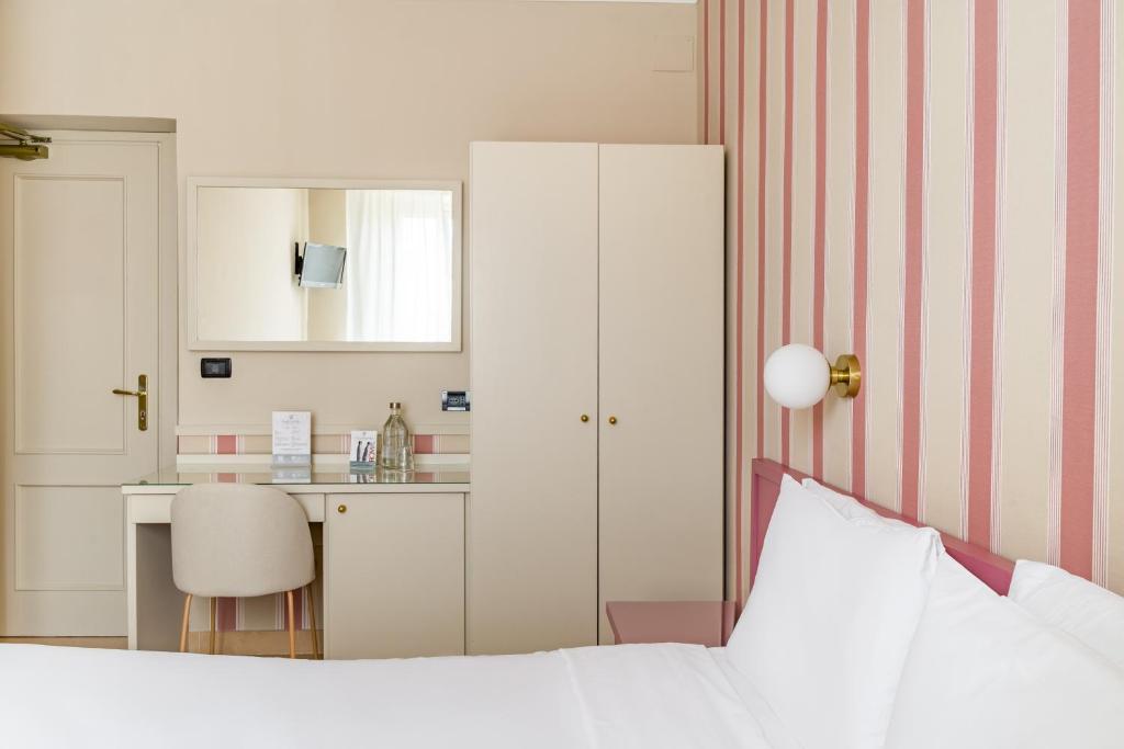 Postel nebo postele na pokoji v ubytování Hotel Parker - Gruppo BLAM HOTELS
