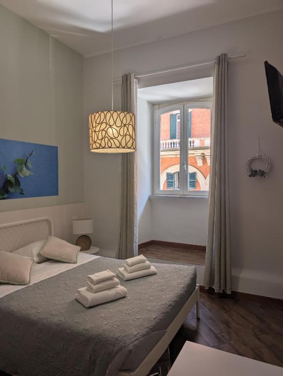 Posteľ alebo postele v izbe v ubytovaní Gracchi 278 - The Italian Stay Collection