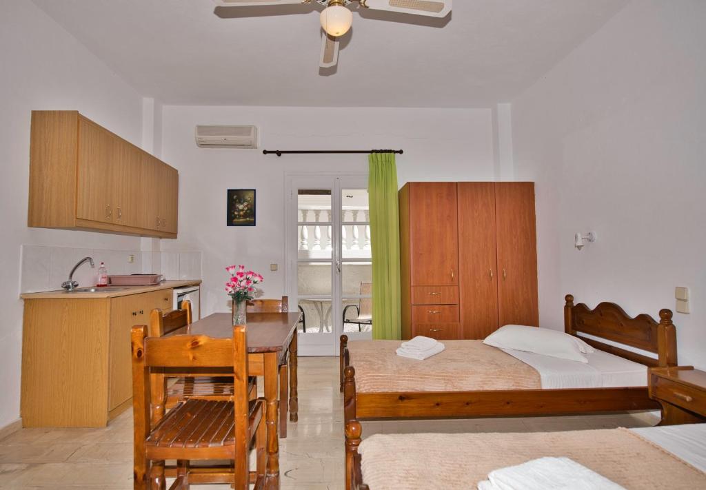 Postel nebo postele na pokoji v ubytování Ira Apartments