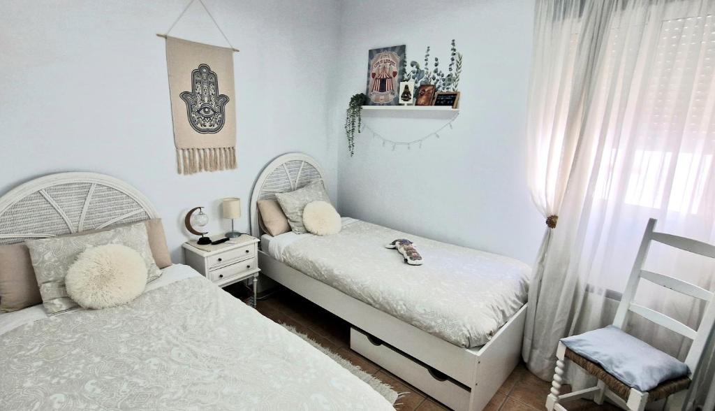 Postel nebo postele na pokoji v ubytování Casa D’Amelia