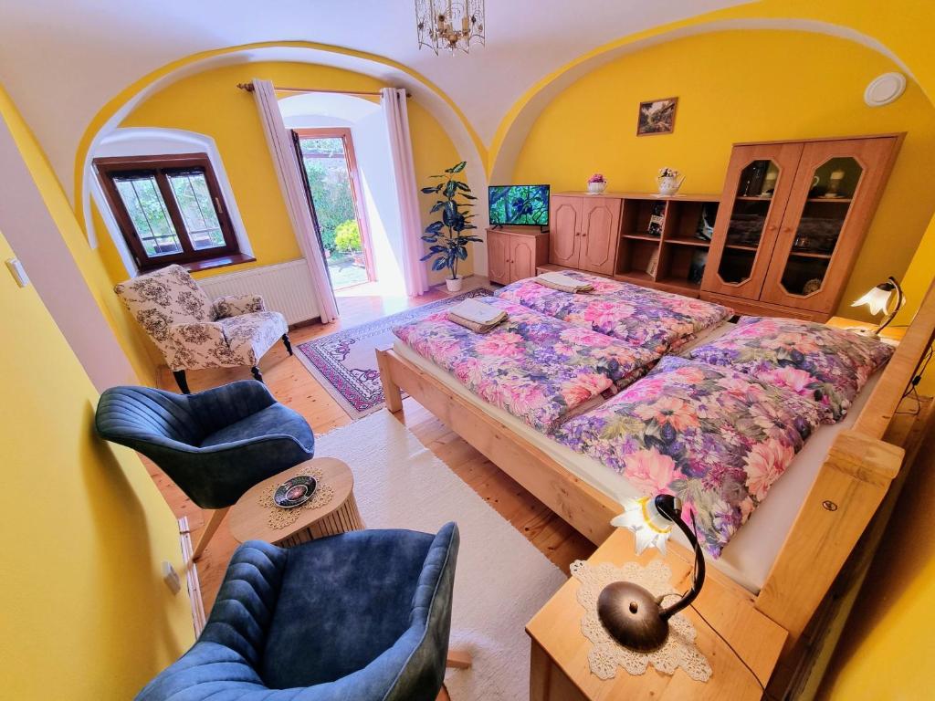 a bedroom with a large bed in a room at Historical house in the center Levoča with parking in Levoča