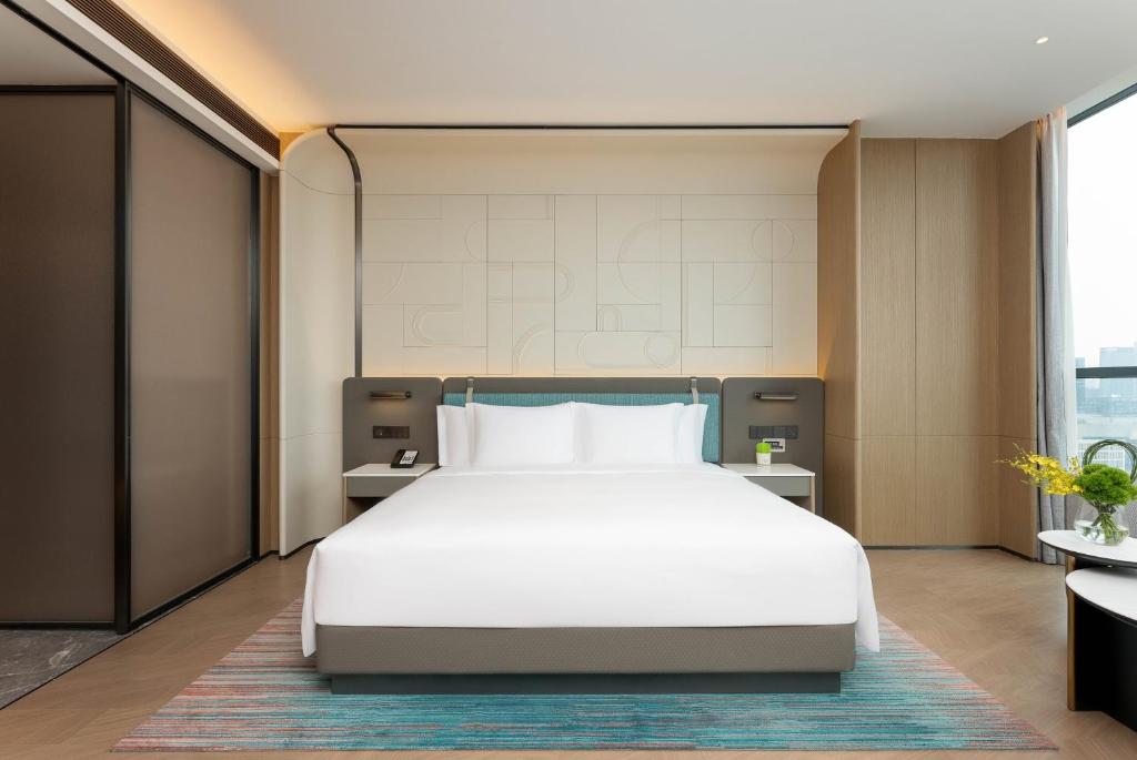 Postel nebo postele na pokoji v ubytování EVEN Hotel Chengdu High-Tech Zone, an IHG Hotel