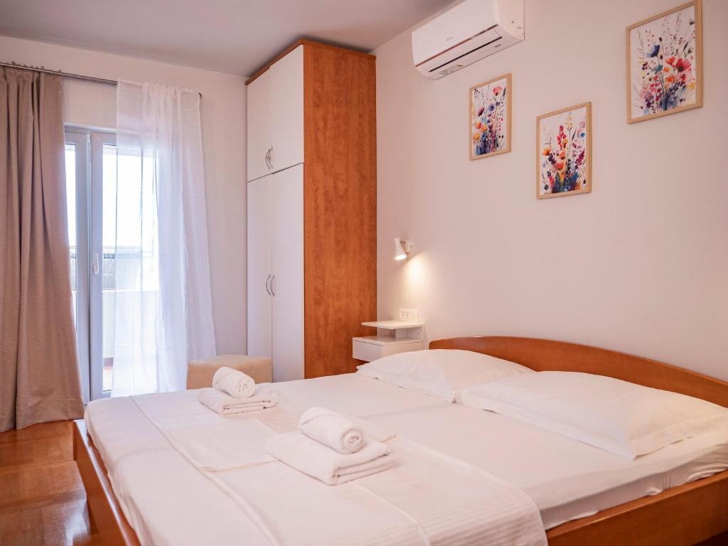 Posteľ alebo postele v izbe v ubytovaní Apartment Jelka- center of Hvar town