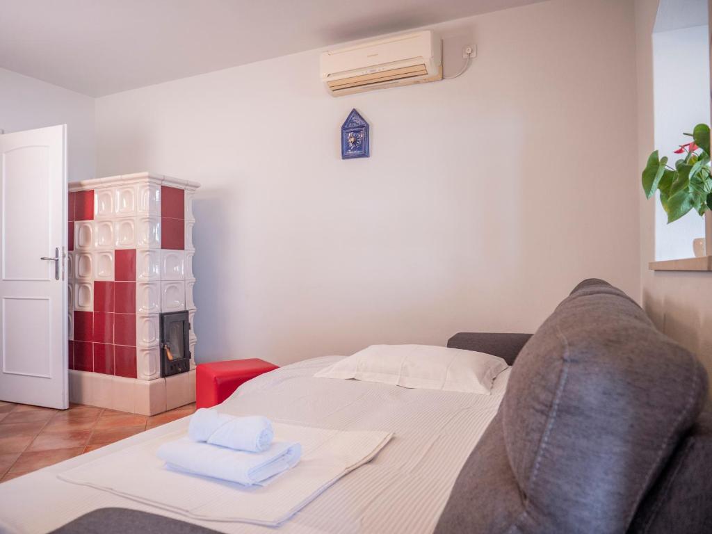 Posteľ alebo postele v izbe v ubytovaní Apartment Jelka- center of Hvar town