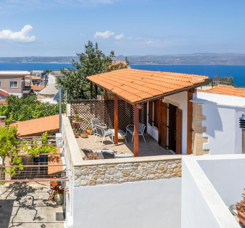 a view from the roof of a house with a pergola at Elenis Dream House in Plaka Chania in Plaka
