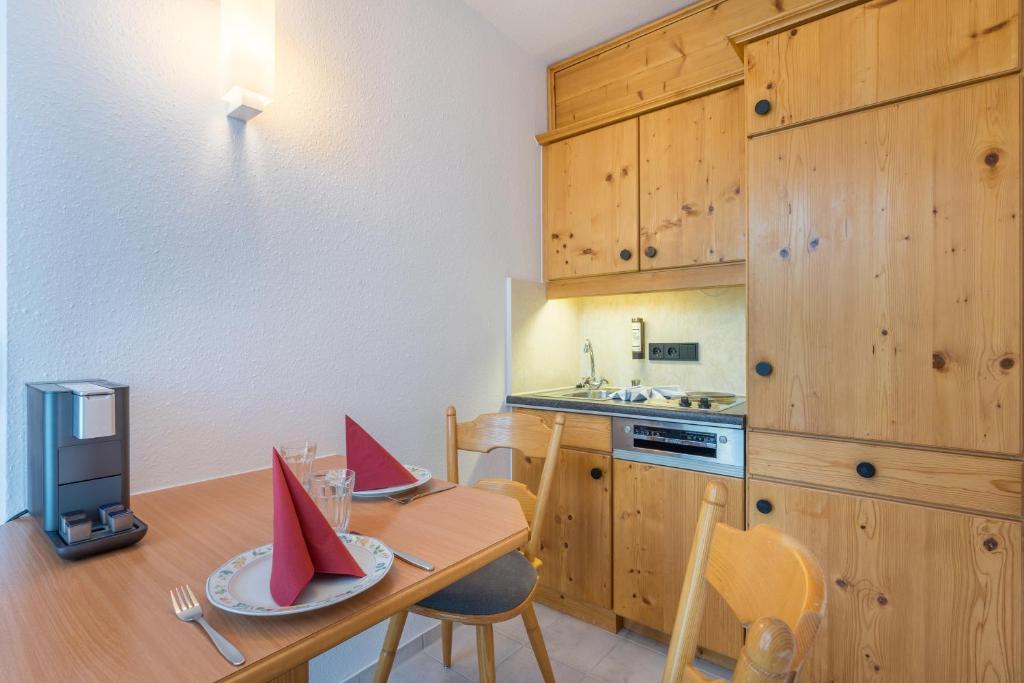 Kuchyň nebo kuchyňský kout v ubytování Residenz Hopfensee