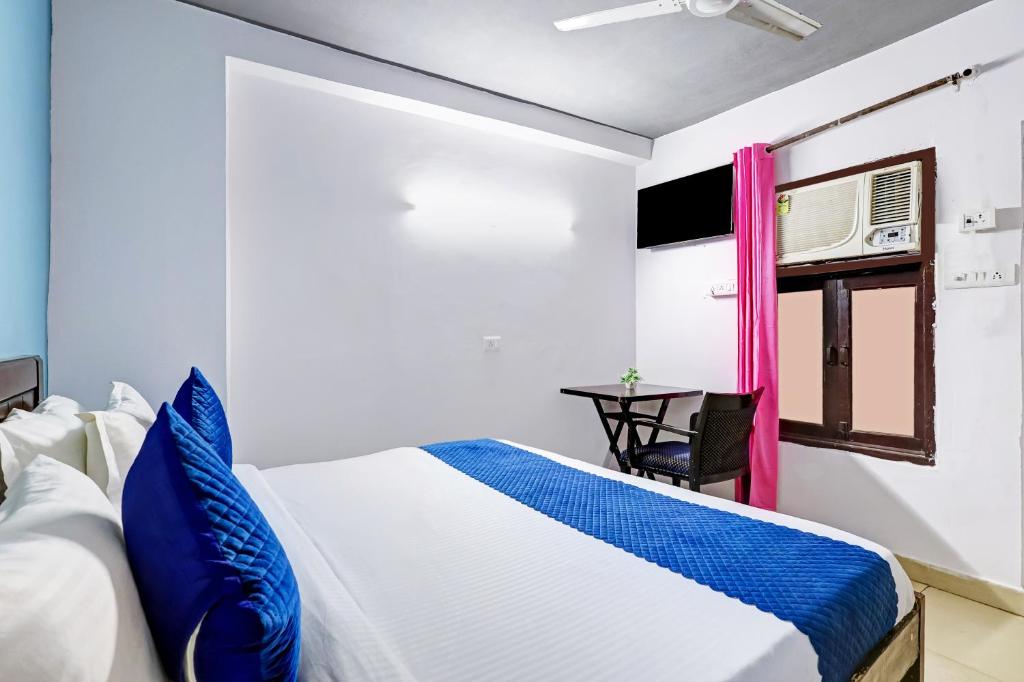 Postel nebo postele na pokoji v ubytování Hotel Great Near Hauz khas Deer Park