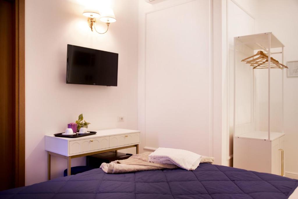 Postel nebo postele na pokoji v ubytování Hotel Silva