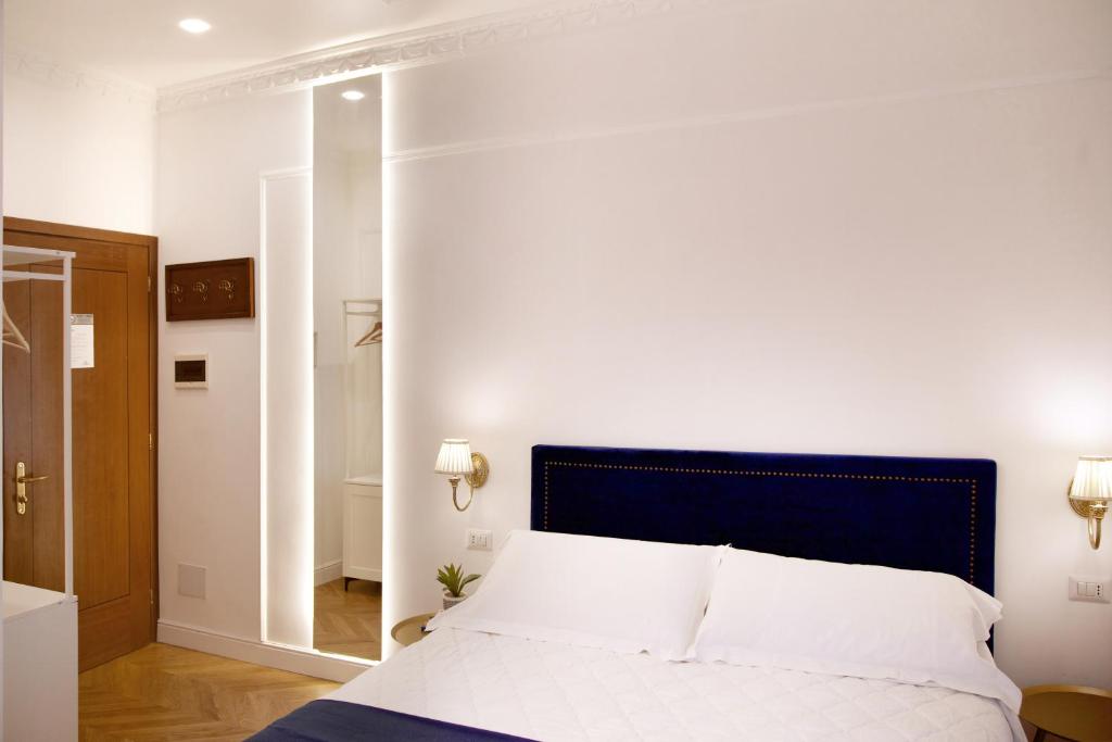 Postel nebo postele na pokoji v ubytování Hotel Silva