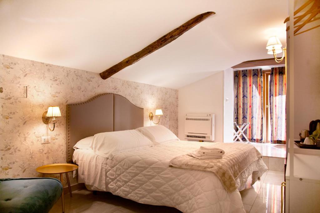Postel nebo postele na pokoji v ubytování Hotel Silva
