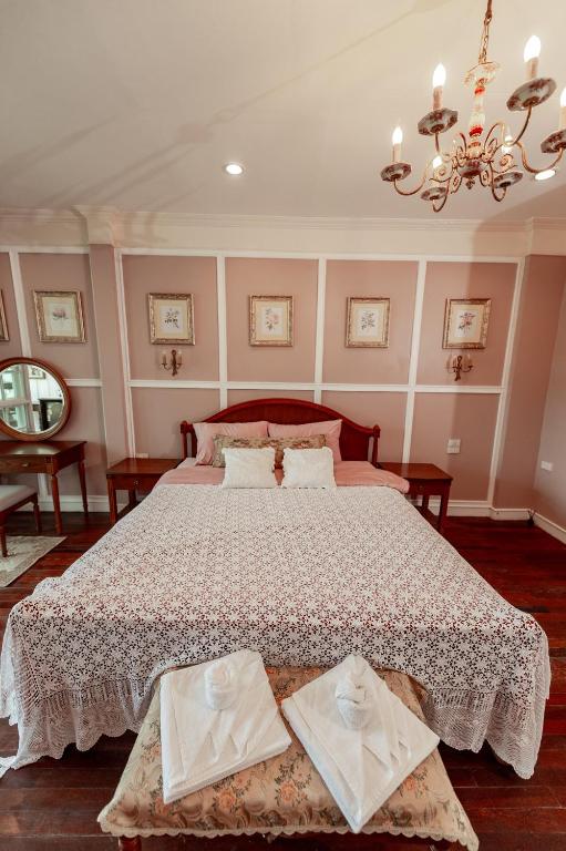 Letto o letti in una camera di Hacienda Home