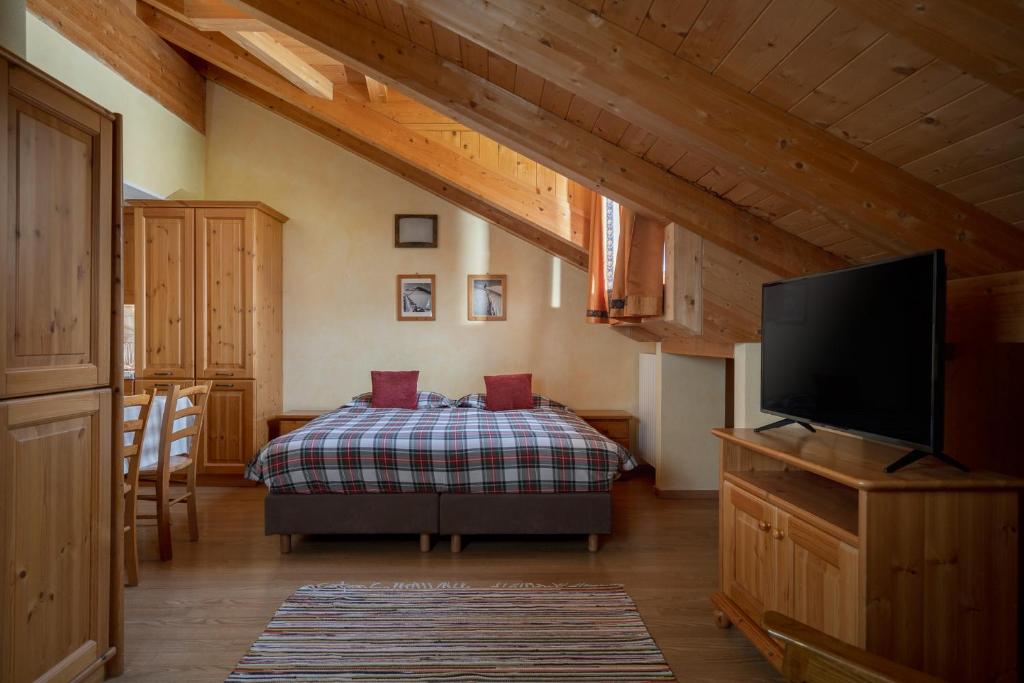 Voodi või voodid majutusasutuse Chalet Stelle Di Neve toas