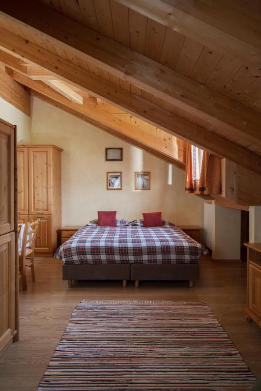 Voodi või voodid majutusasutuse Chalet Stelle Di Neve toas