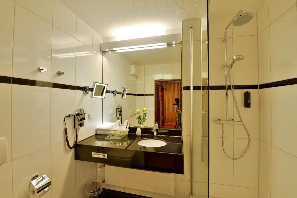 Koupelna v ubytování Carathotel Basel/Weil am Rhein