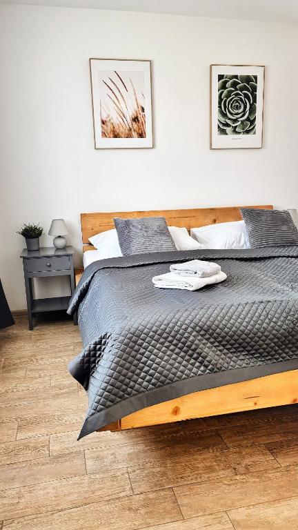 Postel nebo postele na pokoji v ubytování Wellness hotel & minipivovar Kněžínek
