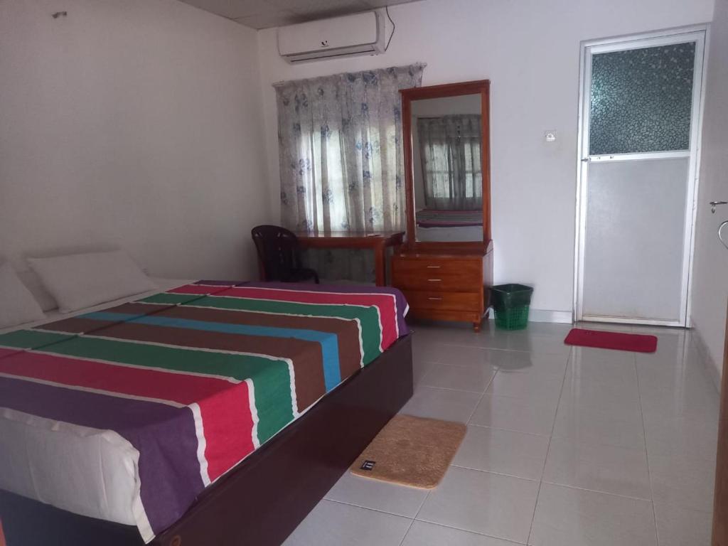 Postel nebo postele na pokoji v ubytování Hotel Sea Shadow
