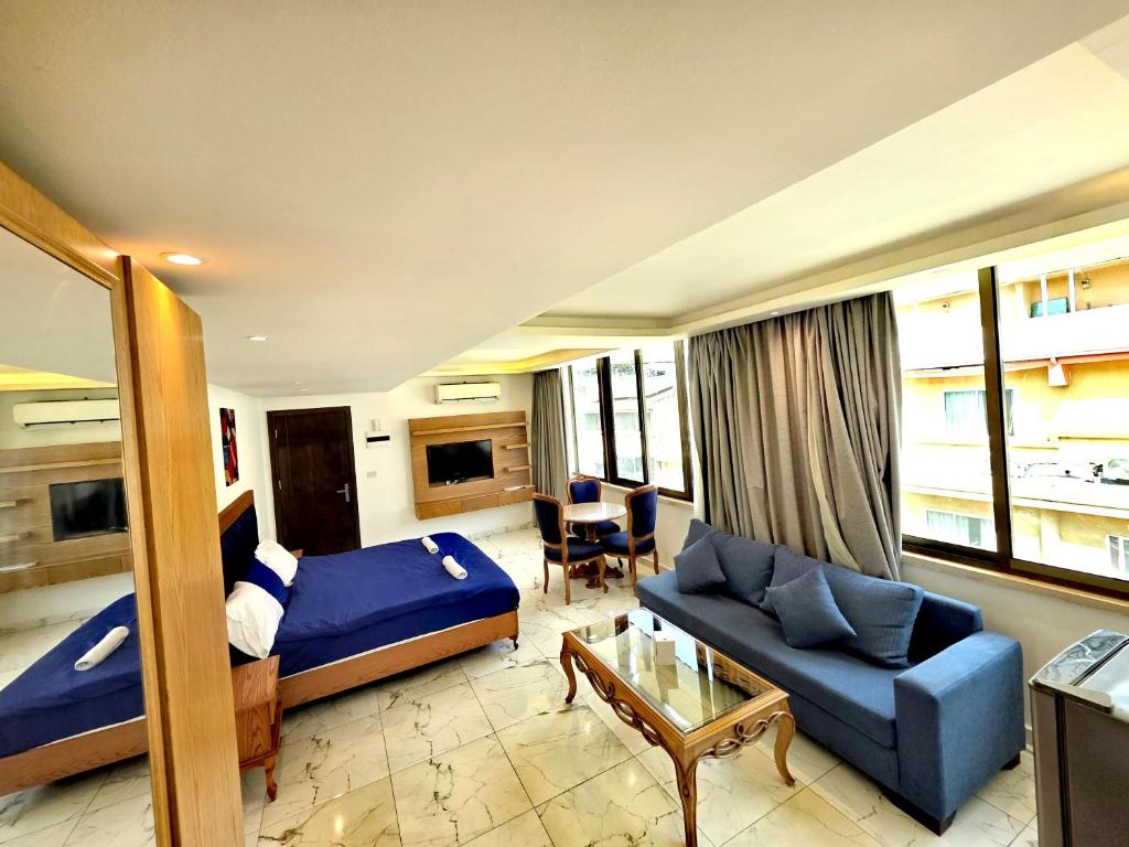 Postel nebo postele na pokoji v ubytování Sama Hamra Hotel