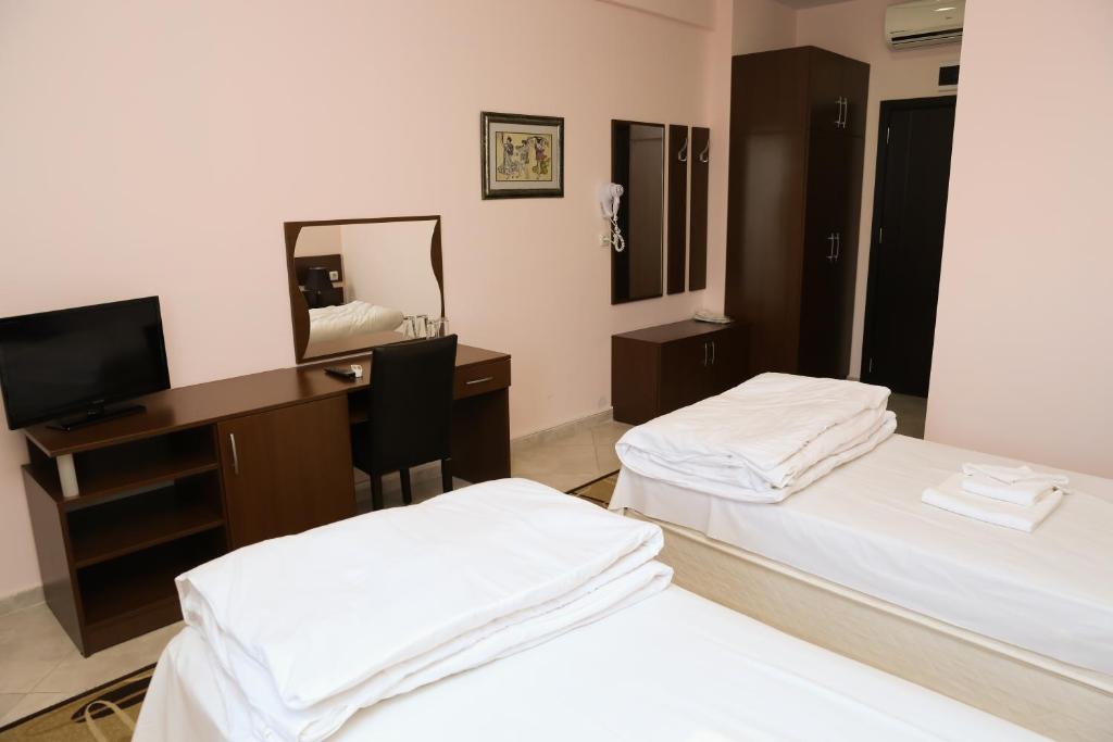 Postel nebo postele na pokoji v ubytování Hotel & Restaurant Ida