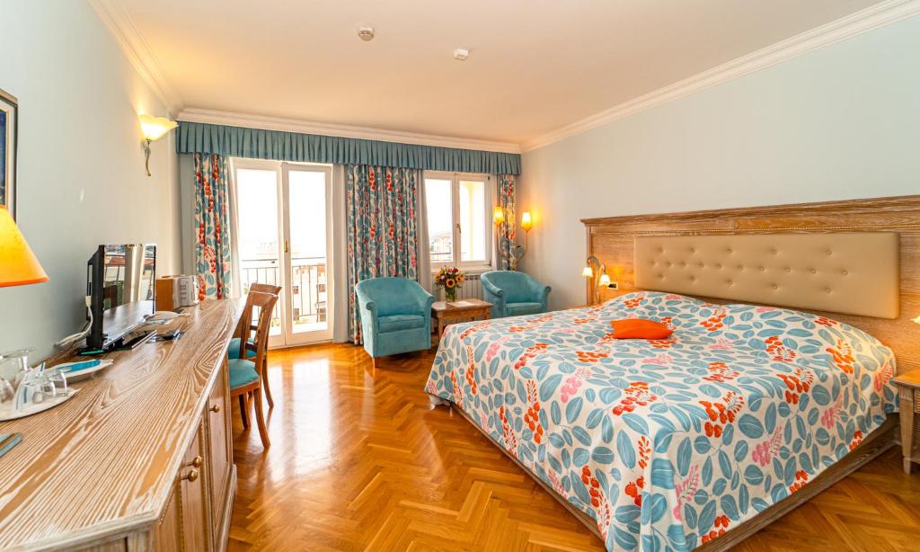 Postel nebo postele na pokoji v ubytování Hotel Miramar