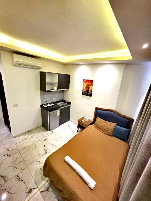 Kuchyň nebo kuchyňský kout v ubytování Sama Hamra Hotel