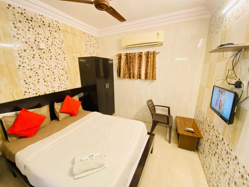 TV a/nebo společenská místnost v ubytování Hotel Jasmine Paldi Ahmedabad