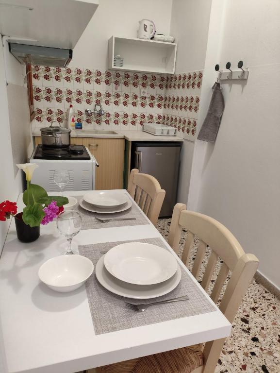 Kuchyň nebo kuchyňský kout v ubytování Apartments Papadioti