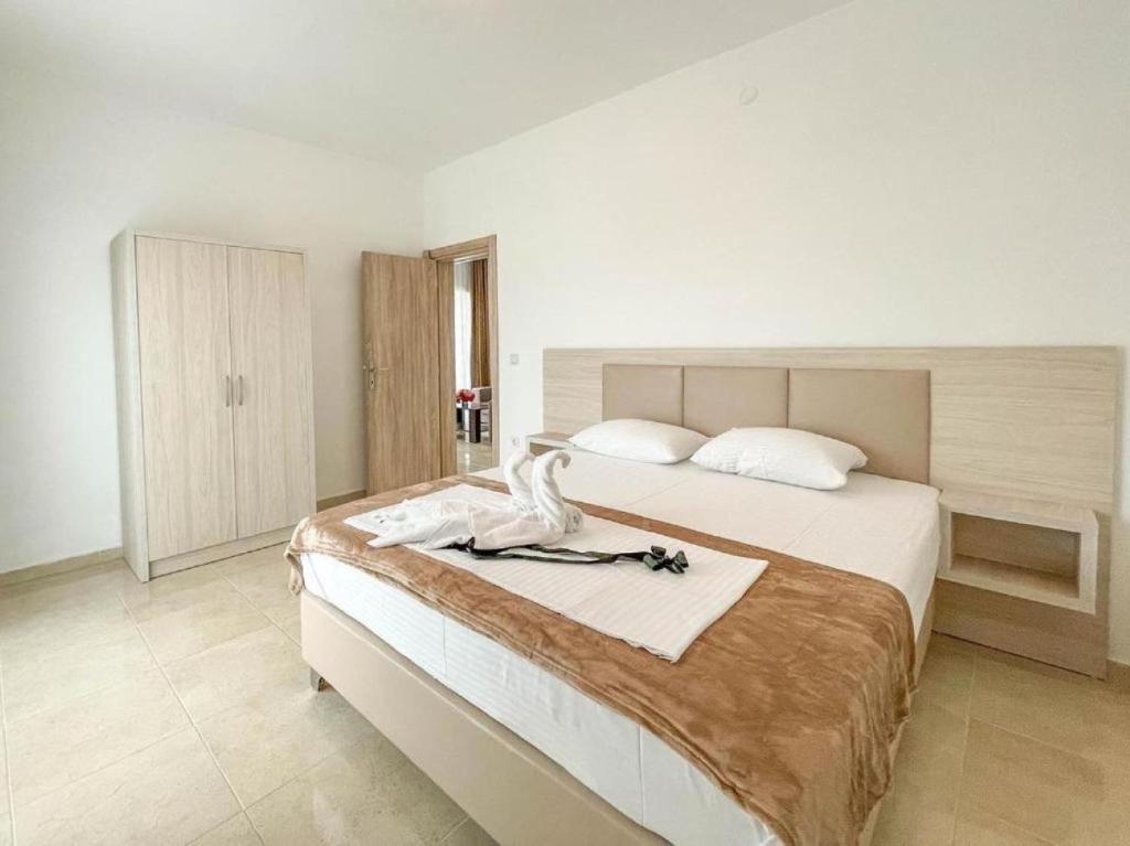 Postel nebo postele na pokoji v ubytování Imperial Hotel