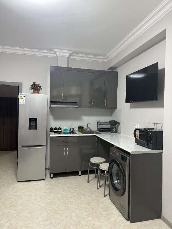 Kuchyň nebo kuchyňský kout v ubytování Guest House MD