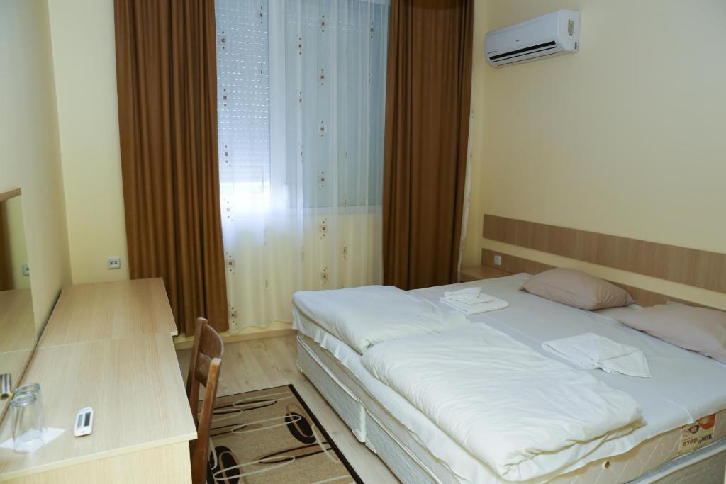 Postel nebo postele na pokoji v ubytování Hotel & Restaurant Ida