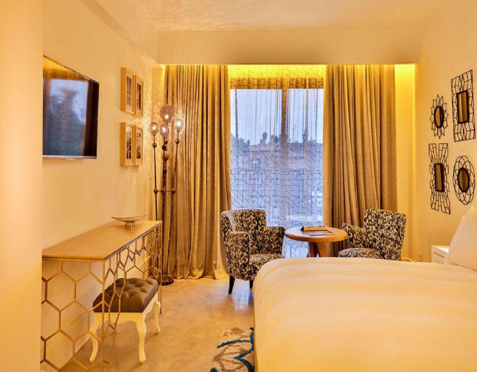 Postel nebo postele na pokoji v ubytování 2Ciels Boutique Hôtel