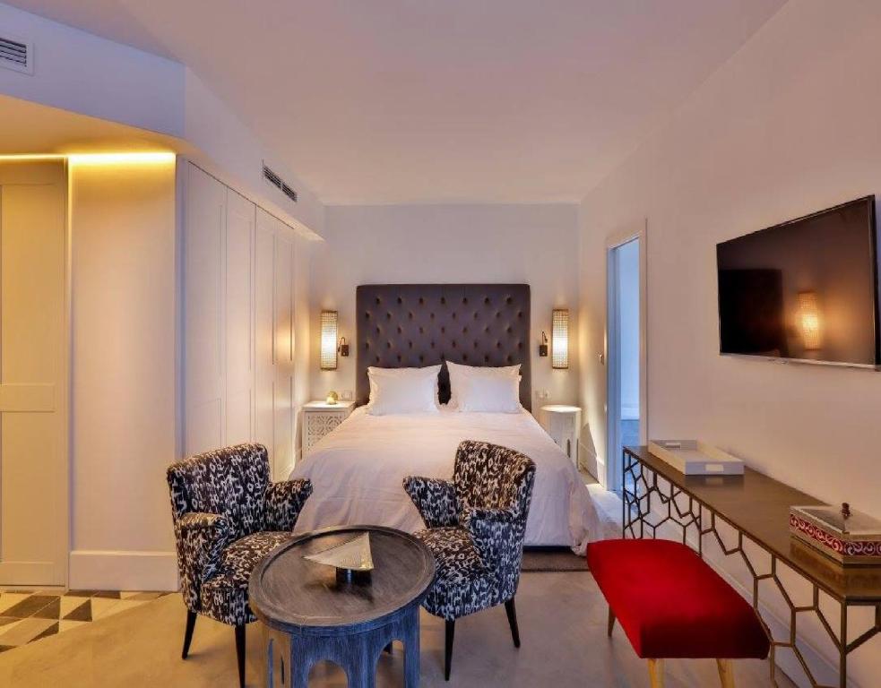 Postel nebo postele na pokoji v ubytování 2Ciels Boutique Hôtel