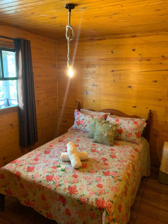Postel nebo postele na pokoji v ubytování Cabanas Leão da Tribo de Judá