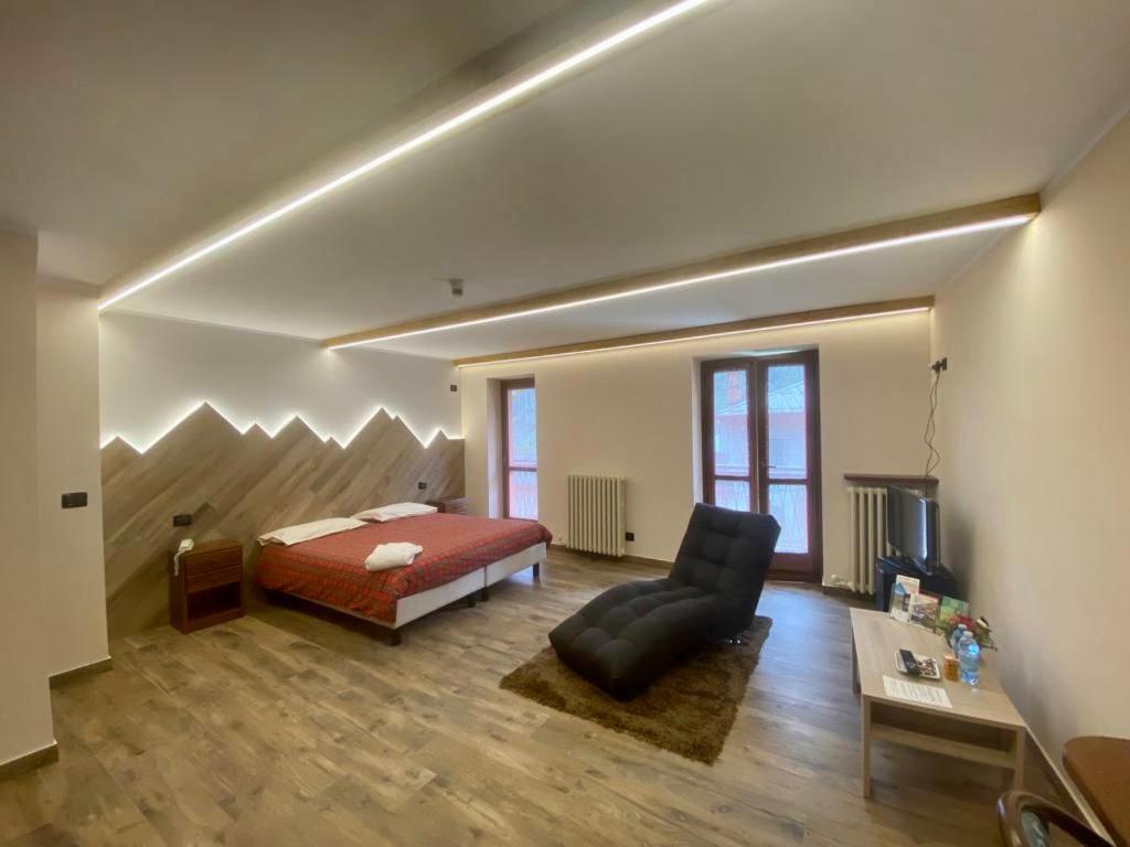 Postel nebo postele na pokoji v ubytování Hotel Ristorante Ligure
