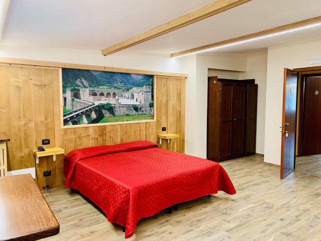 Postel nebo postele na pokoji v ubytování Hotel Ristorante Ligure