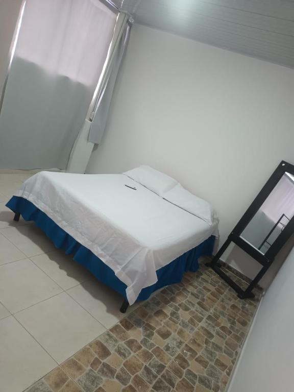 Postel nebo postele na pokoji v ubytování Apartahotel completo