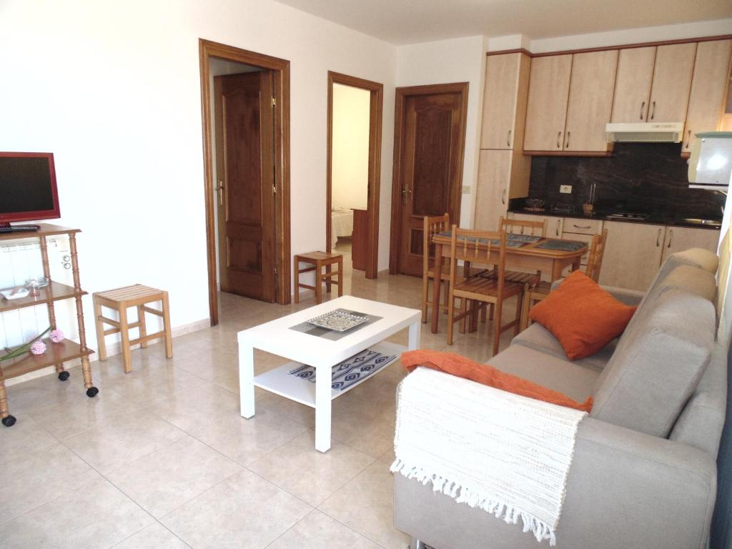 TV a/nebo společenská místnost v ubytování APARTAMENTOS OUTEIRO